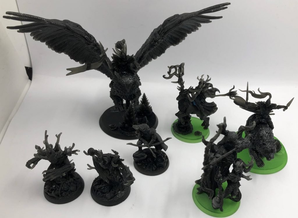 A Redleaf Elves warband just printed on a 3D printer with black resin.